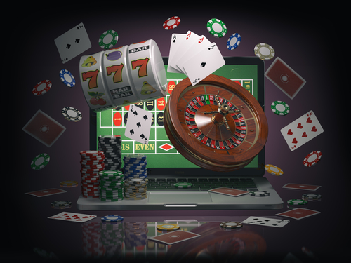 illustration en 3d d'un ordinateur et d'une multitude de jeux de casino